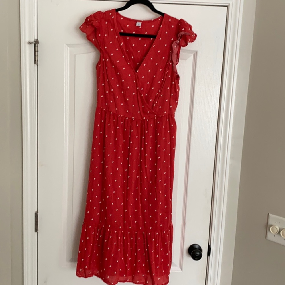 Polka dot tea length dress with ruffle sleeves